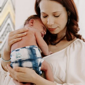 Woman holding newborn baby