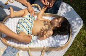 toddler in an all-in-one diaper