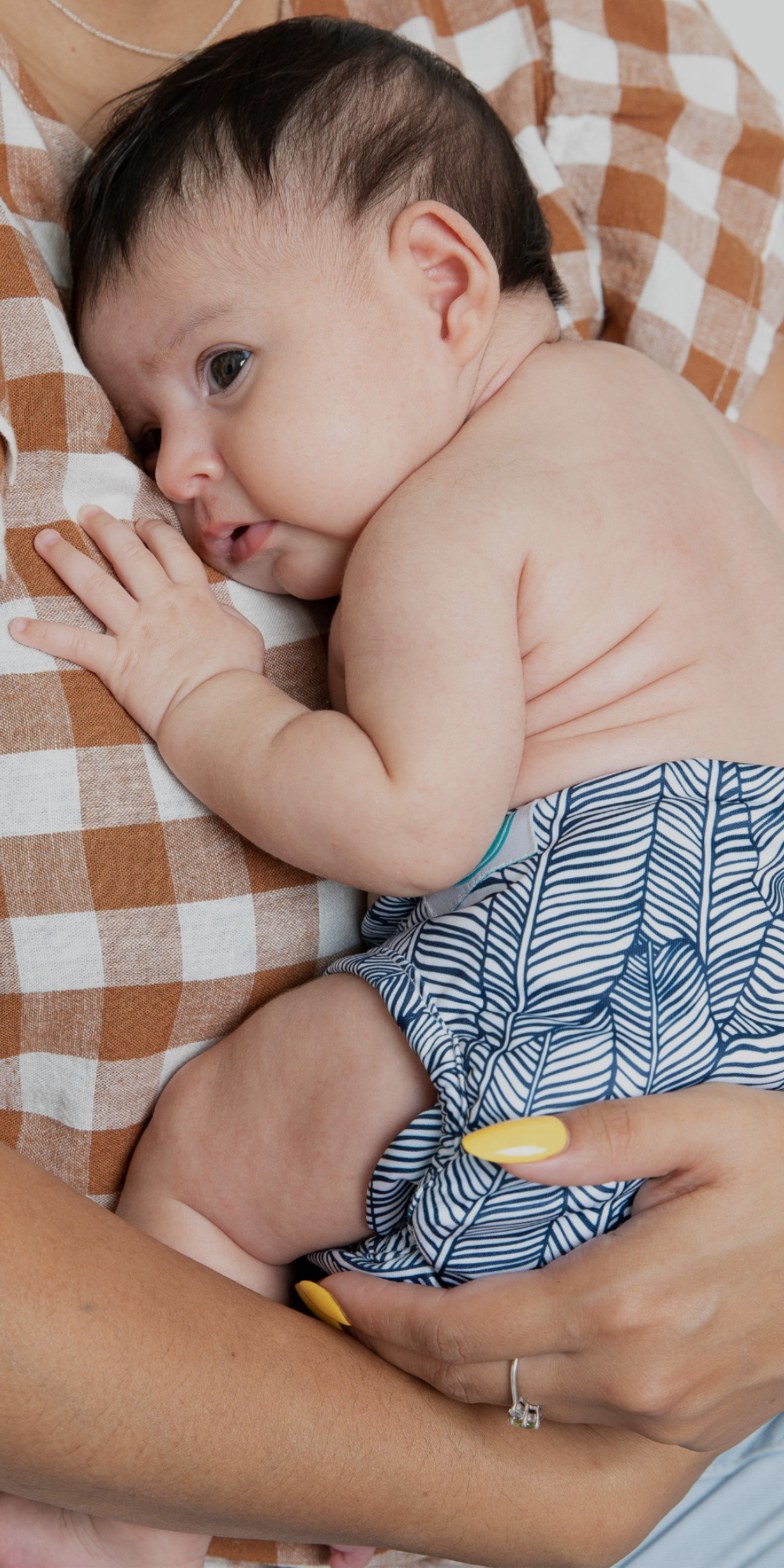 Woman holding newborn baby
